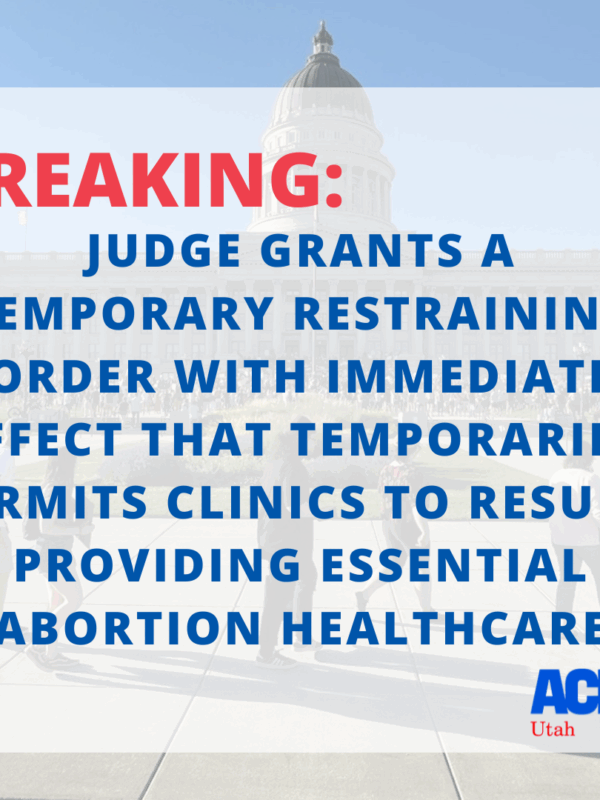 Graphic breaking news "judge grants a temporary restraining order with immediate effect that temporarily permits clinics to resume providing essential abortion healthcare"