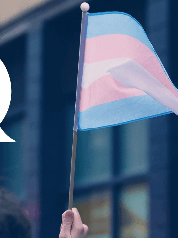 Photo for FAQ with a FAQ speech bubble next to a transgender flag.