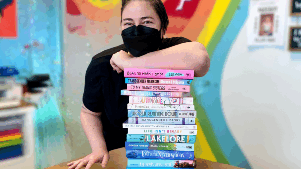 Head shot of Kaitlyn Mahoney (they/she), owner of Under the Umbrella Bookstore, ACLU of Utah's 2024 Torch of Freedom Awardee