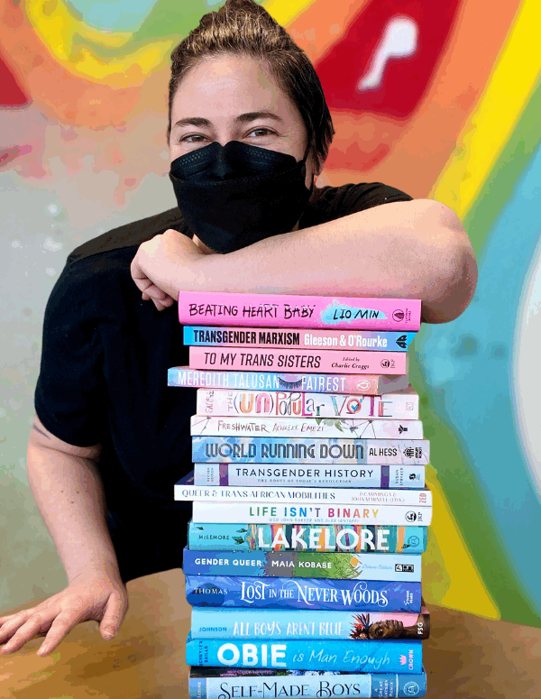 Head shot of Kaitlyn Mahoney (they/she), owner of Under the Umbrella Bookstore, ACLU of Utah's 2024 Torch of Freedom Awardee