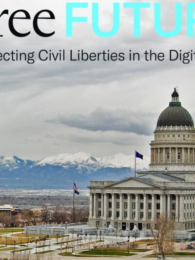 The Utah State Capitol with snowy mountains in the background