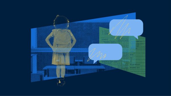 A young girl looking towards a classrom.