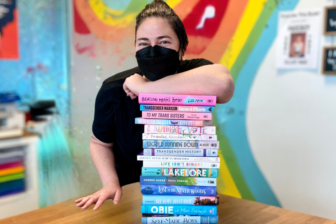 Head shot of Kaitlyn Mahoney (they/she), owner of Under the Umbrella Bookstore, ACLU of Utah's 2024 Torch of Freedom Awardee